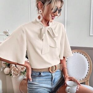Elegant Cream Blouse with Bow Tie
